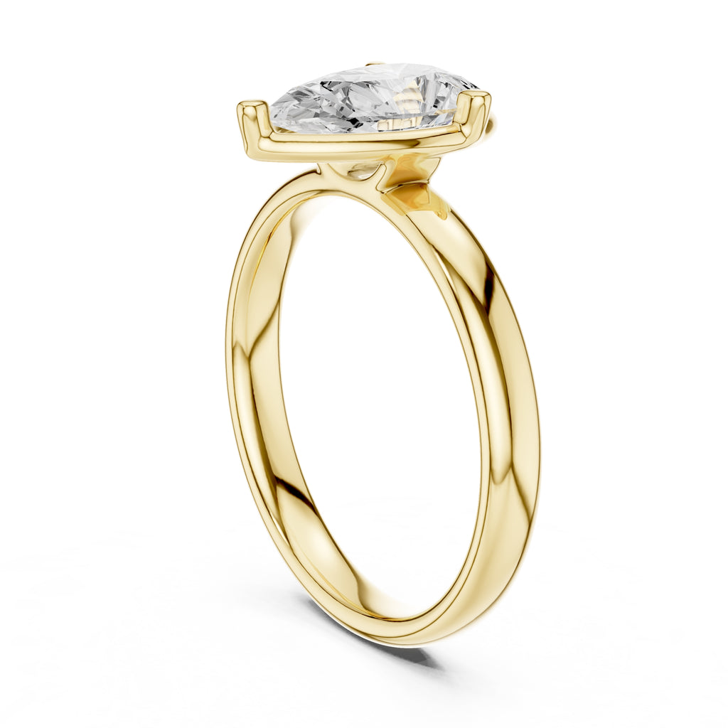 The Golden Pillar Solitaire 1.5ct Yellow Gold Pear